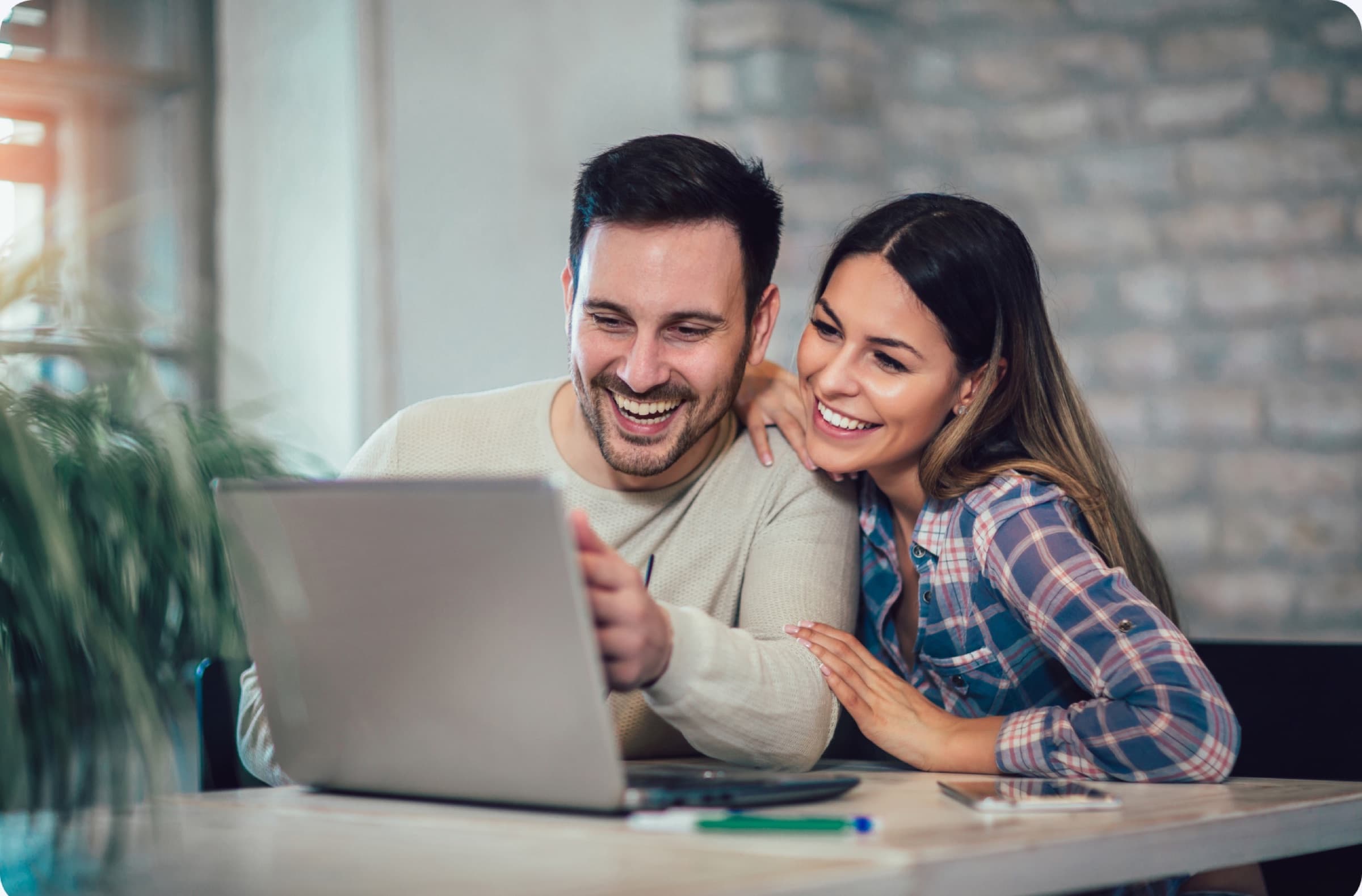 Mortio agent reviewing a mortgage application with clients